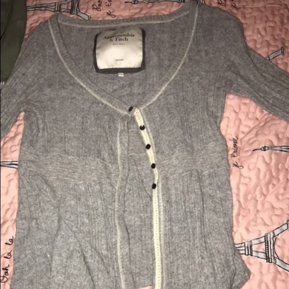 grey and white bottom up sweater